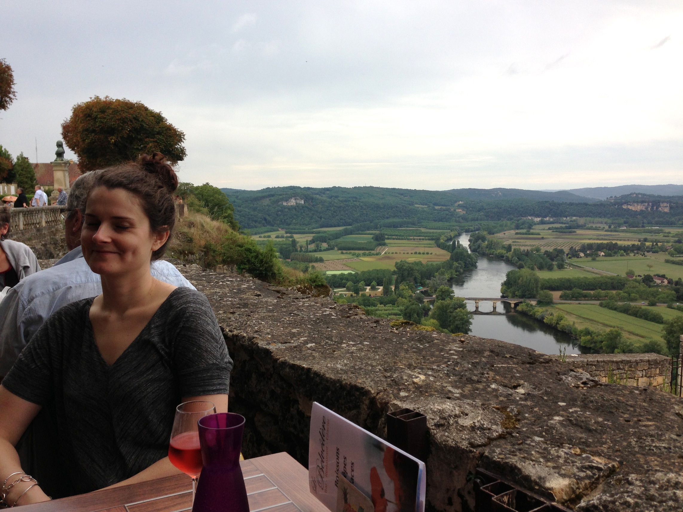 In this picture, I am sitting next to something beautiful while drinking a glass of rosé. This activity has occupied approximately 70% of my time in France.
