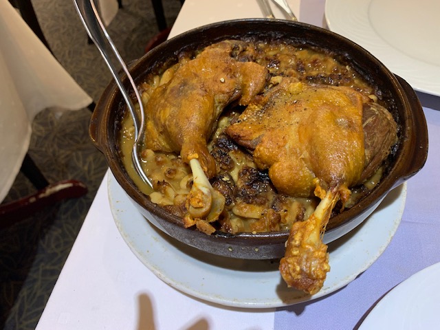 That is duck confit on top. It's a good example of why, when Nic asks me what part of the roasted chicken I want as he's carving, I say 